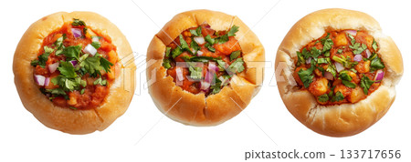 Indian Vada pav bread stuffed with spicy vegetable curry, garnished with onions and herbs, isolated on white background 133717656