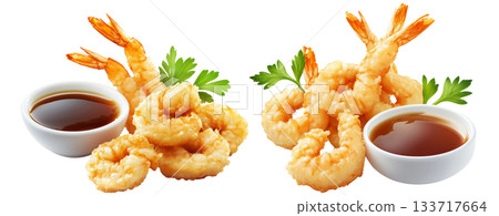 Fried shrimp tempura garnished with black sesame seeds, served with soy sauce in a bowl isolated on white background Fried shrimp tempura garnished with black sesame seeds, served with soy sauce in a bowl isolated on white background 133717664
