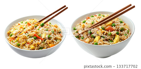Fried rice with peas, scrambled eggs, red bell peppers, and beef pieces in ceramic bowl isolated on white background Fried rice with peas, scrambled eggs, red bell peppers, and beef pieces in ceramic bowl isolated on white background 133717702