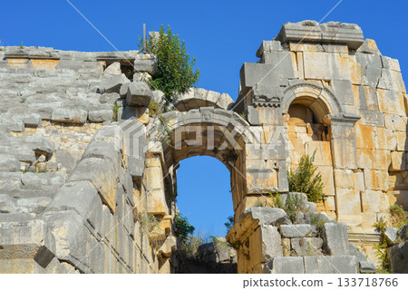 Ruins of the ancient city of Myra in Demre, Turkey, Face stone relief of ancient town of Myra in Lycia. Ruins of the ancient city of Myra in Demre, Turkey, Face stone relief of ancient town of Myra in Lycia. 133718766