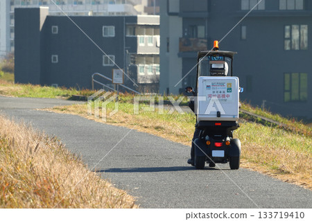 River office staff patrolling the Arakawa riverbed (Kita Ward, Tokyo) 133719410
