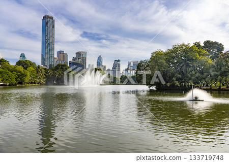Lumpini Park and skyscrapers in Bangkok, Thailand 133719748
