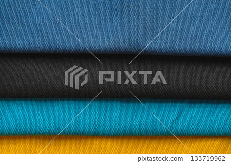 Four different coloured canvases 133719962