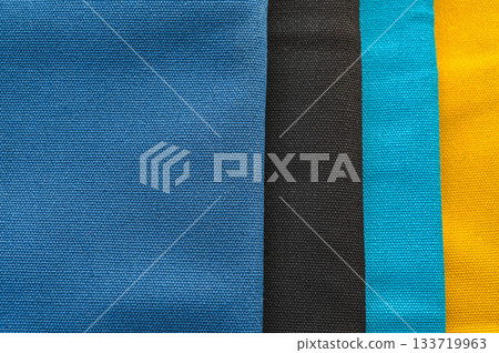 Four different coloured canvases 133719963