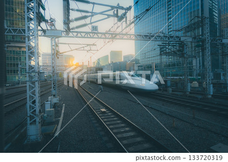 Shinkansen running through the dusk 133720319