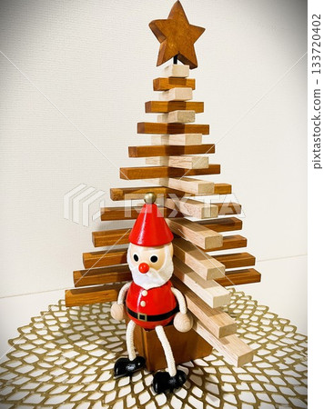 Christmas display with wooden tree and Santa Claus doll 1 Christmas display with wooden tree and Santa Claus doll 1 133720402