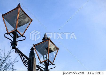 Winter blue sky and classic gas lamps 133720948