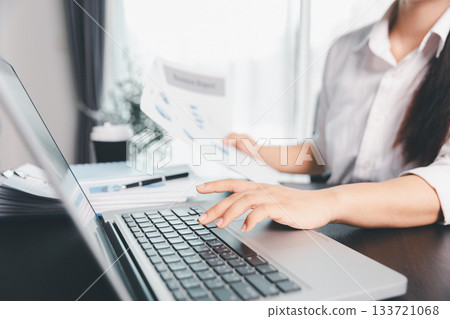 Business woman analyze calculate company financial, tax results office accounting statistics analytical research. calculating business balance prepare tax reduction. Tax deduction planning concept. 133721068