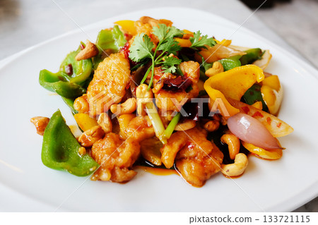 Stired-fried Chicken with Cashew Nuts in white dish. Thai food 133721115