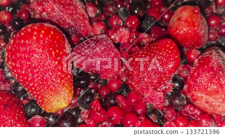 Frozen fruit. Fruit mix of currants and strawberries. Preserves for the winter. Frozen fruit. Fruit mix of currants and strawberries. Preserves for the winter. 133721396