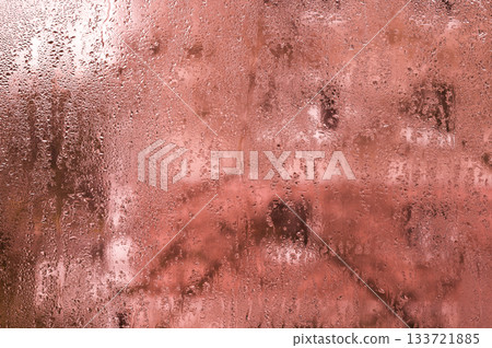 abstract background of purple wet glass. window covered with tiny water droplets. humidity forms natural pattern on transparent surface. backdrop with natural pattern texture of wet glass. water drops 133721885