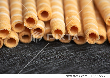 Close-Up of Crunchy Wafer Rolls Highlighting the Sweetness Close-Up of Crunchy Wafer Rolls Highlighting the Sweetness 133722270