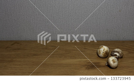 Fresh Mushrooms on Wooden Table Surface for Culinary Use Fresh Mushrooms on Wooden Table Surface for Culinary Use 133723945