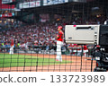 A large television camera broadcasting live from Mazda Stadium Hiroshima 133723989
