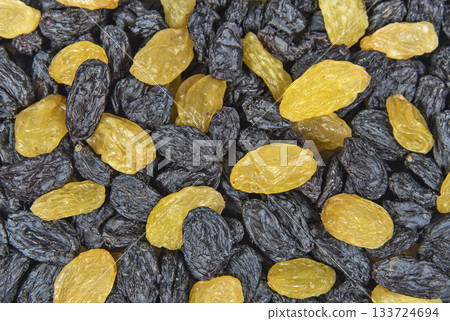 Berries of black and yellow raisins Berries of black and yellow raisins 133724694