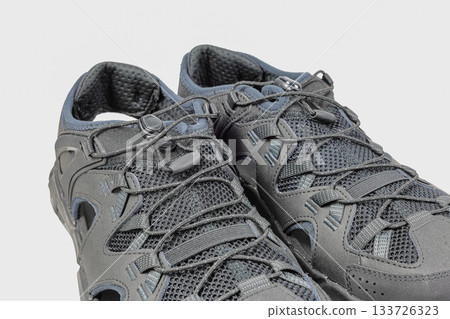 Close up shoelaces on Casual hiking shoes, background pattern texture. Close up shoelaces on Casual hiking shoes, background pattern texture. 133726323