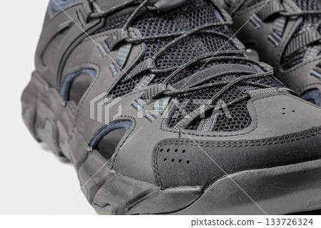 Close up shoelaces on Casual hiking shoes, background pattern texture. Close up shoelaces on Casual hiking shoes, background pattern texture. 133726324