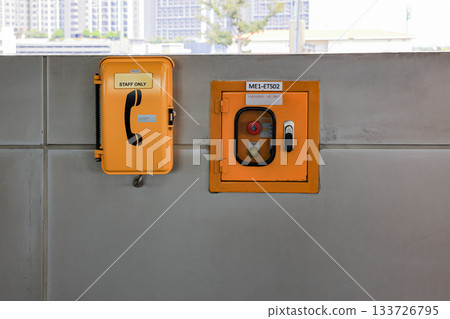 Emergency phones at the public transport hub or train Station. Emergency phones at the public transport hub or train Station. 133726795