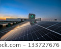 Solar Panel Photovoltaic installation on a Roof of factory, sunny blue sky background, alternative electricity source - Sustainable Resources Concept. 133727676