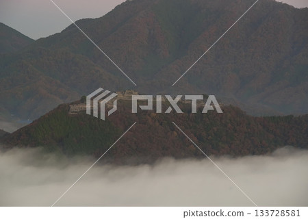 Mysterious scenery of Takeda Castle ruins floating in a sea of clouds 133728581