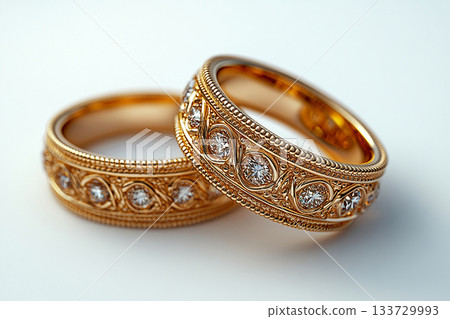Luxury pair of Wedding Rings on a white background. Rococo Renaissance style. 133729993
