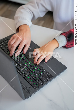 Child Learning Keyboard Skills with Adult Help Child Learning Keyboard Skills with Adult Help 133731320