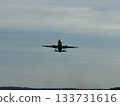 A shot of a passenger plane ascending shortly after takeoff 133731616