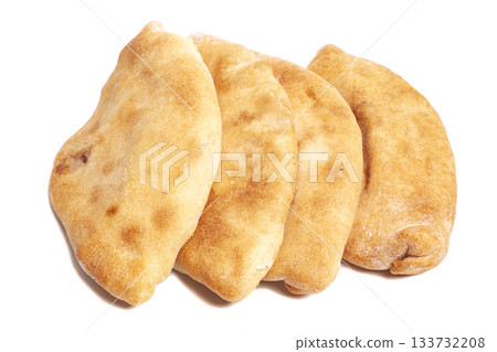 Pies with cabbage (pirozhki) isolated on white. Homemade baking Pies with cabbage (pirozhki) isolated on white. Homemade baking 133732208