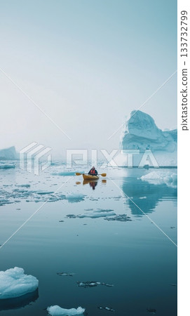 Experience the exhilarating adventure of kayaking through stunning icebergs in pristine, untouched waters Experience the exhilarating adventure of kayaking through stunning icebergs in pristine, untouched waters 133732799
