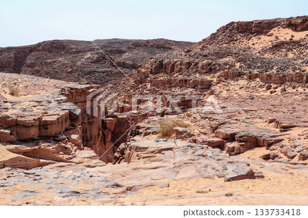 Colored Canyon, Sinai Desert, Egypt. Tourists from all over the world travel through the gorge. Active lifestyle concept. Landmark of Egypt 133733418