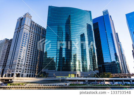 Chicago, Illinois, USA - October 21, 2024: Skyscraper building architecture. Business skyscraper of glass. Skyscraper in city. City downtown with skyscraper. Office building in business district 133733548