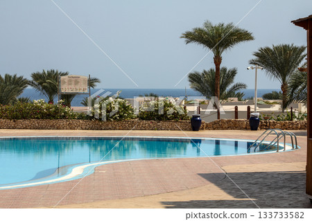 View of the swimming pool in the Grande Sharm Resort and Spa located which one of Egypt beautiful Red Sea Riviera. Travel destinations. View of the swimming pool in the Grande Sharm Resort and Spa located which one of Egypt beautiful Red Sea Riviera. Travel destinations. 133733582