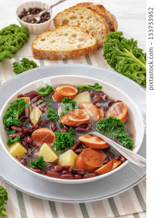 Red kidney bean, potato, kale and sausage soup 133733952