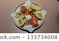 Heart shaped waffle with boiled egg, smoked salmon, potato, and cream cheese 133734008