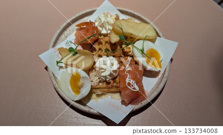 Heart shaped waffle with boiled egg, smoked salmon, potato, and cream cheese Heart shaped waffle with boiled egg, smoked salmon, potato, and cream cheese 133734008