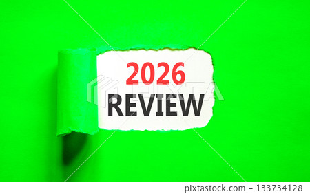 2026 Review symbol. Concept words 2026 Review on beautiful white paper. Beautiful green paper background. Business and 2026 review concept. Copy space. 2026 Review symbol. Concept words 2026 Review on beautiful white paper. Beautiful green paper background. Business and 2026 review concept. Copy space. 133734128