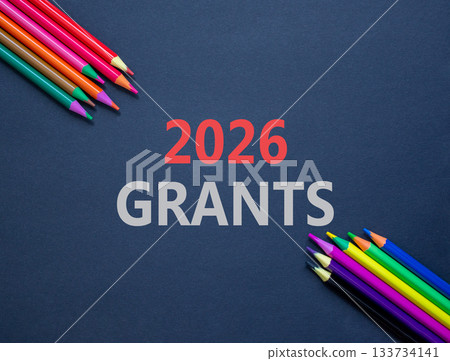 2026 Grants symbol. Concept words 2026 Grants on beautiful black paper. Beautiful black paper background. Beautiful colored pencils. Business and 2026 grants concept. Copy space. 133734141