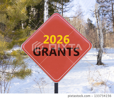 2026 Grants symbol. Concept words 2026 Grants on beautiful red road sign. Beautiful winter forest background. Business and 2026 grants concept. Copy space. 2026 Grants symbol. Concept words 2026 Grants on beautiful red road sign. Beautiful winter forest background. Business and 2026 grants concept. Copy space. 133734156