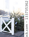 Christmas tree disposal area in the city after the holiday season 133735362
