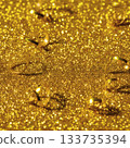 Vibrant gold glitter background: Festive serpentine ribbons texture 133735394