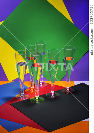 Still life with wine glasses on a colored background 133735733
