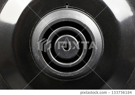 Close-up of Electric Kettle Power Connector Base on Black Background 133736184