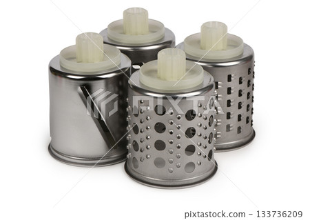 Four Metal Drum Attachments for Electric Food Grinder or Slicer clipping paths included. Four Metal Drum Attachments for Electric Food Grinder or Slicer clipping paths included. 133736209