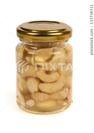 Small Glass Jar of Whole Cashew Nuts Preserved in Honey Small Glass Jar of Whole Cashew Nuts Preserved in Honey 133736311