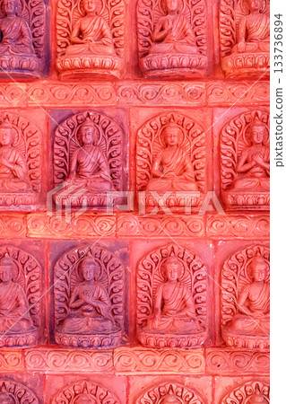 A bas-relief with multiple Buddha figures in Nanshan Park, Sanya, Hainan. A bas-relief with multiple Buddha figures in Nanshan Park, Sanya, Hainan. 133736894
