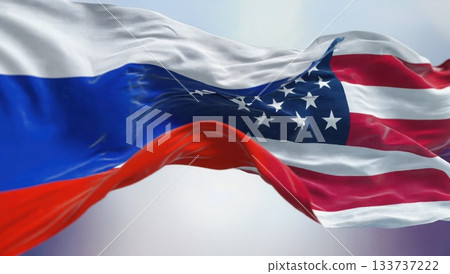 merged russian and american national banners waving together in daylight sky symbolizing partnership tension diplomacy concept of politics international relations 133737222