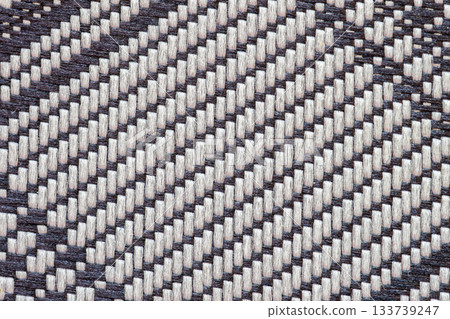 Handwoven fabric pattern with dark and white threads creating artisan textile design. Natural background, texture, copy space. Traditional weaving, craft handmade fabric Handwoven fabric pattern with dark and white threads creating artisan textile design. Natural background, texture, copy space. Traditional weaving, craft handmade fabric 133739247