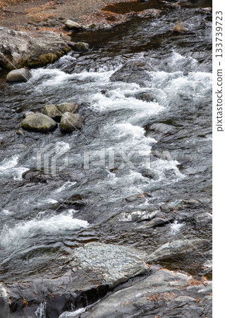 Autumn waterfall flow of mountain stream Autumn waterfall flow of mountain stream 133739723
