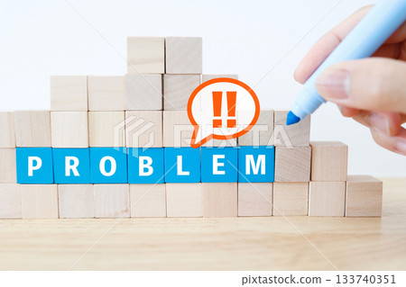 A wall of PROBLEM building blocks indicating a problem has occurred. 133740351