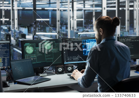 Data center engineer using AI assistant to manage global server infrastructure with international networks. Admin using artificial intelligence LLM to monitor worldwide system operations Data center engineer using AI assistant to manage global server infrastructure with international networks. Admin using artificial intelligence LLM to monitor worldwide system operations 133740633